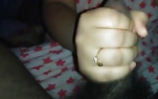 Horny indian babe is giving him a hand job and gets cum covered